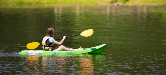 Girl on Kayak at the lake