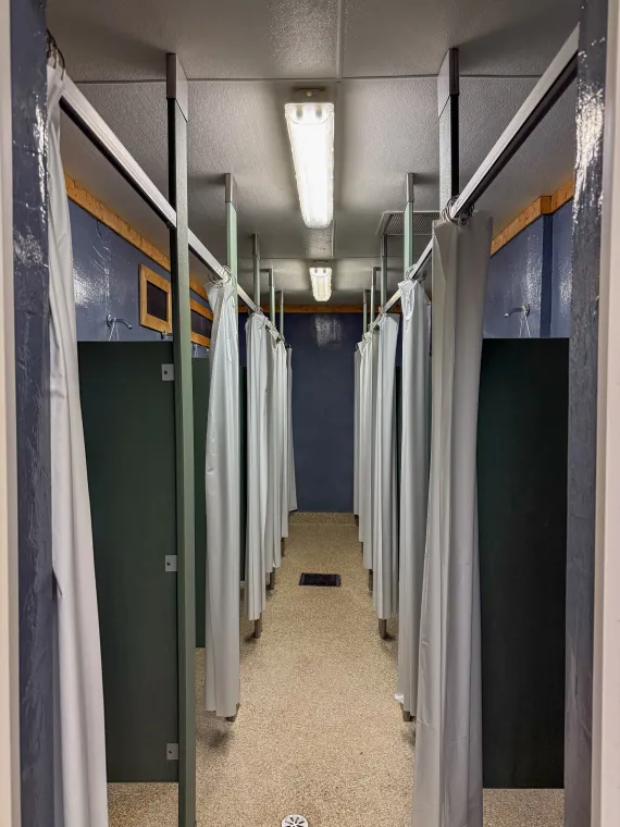 An image of showers in the girls bathhouse.